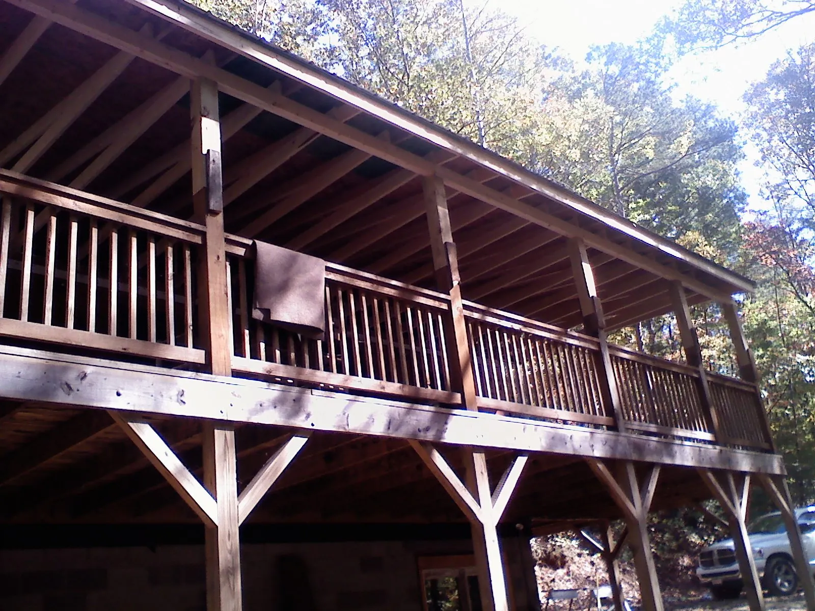 Timber framing under a new elevated porch and deck — Roof Leak Repair in Reston by Roofing Brothers